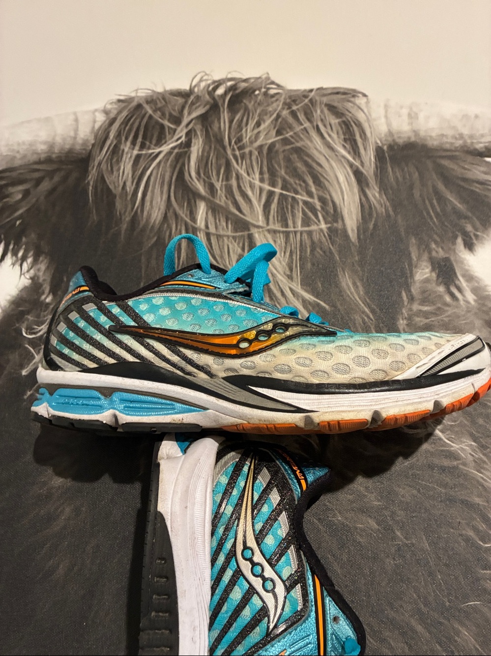 Saucony Women's Running Shoe in Teal with Orange Accents